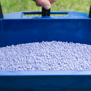 St Catharines ON lawn care - a fertilizer spreader being prepared for fertilizing a lawn